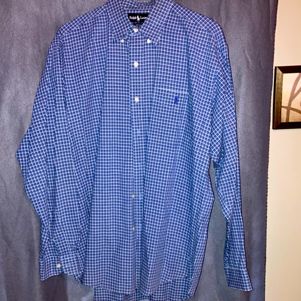 New only tried on but took tag off never been washed blue long sleeve